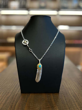 Goros Gold Top Gold Rope Turquoise Feather and Silver Wheel Setup