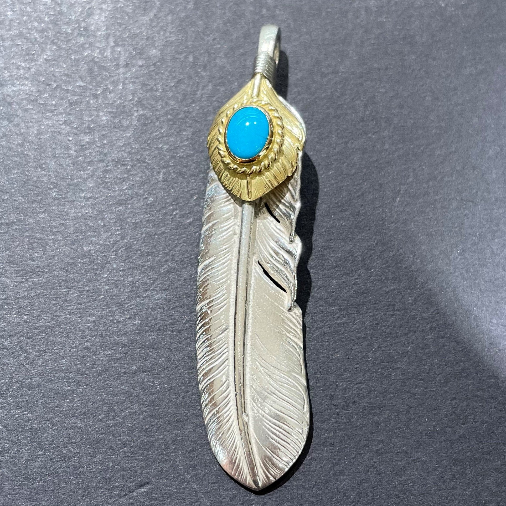 Goro&#39;s Turquoise Feather Gold Rope - Facing Left | Goros Authorized Dealer