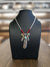 Goros Turquoise Feather With Red Beads Leather Cord Setup