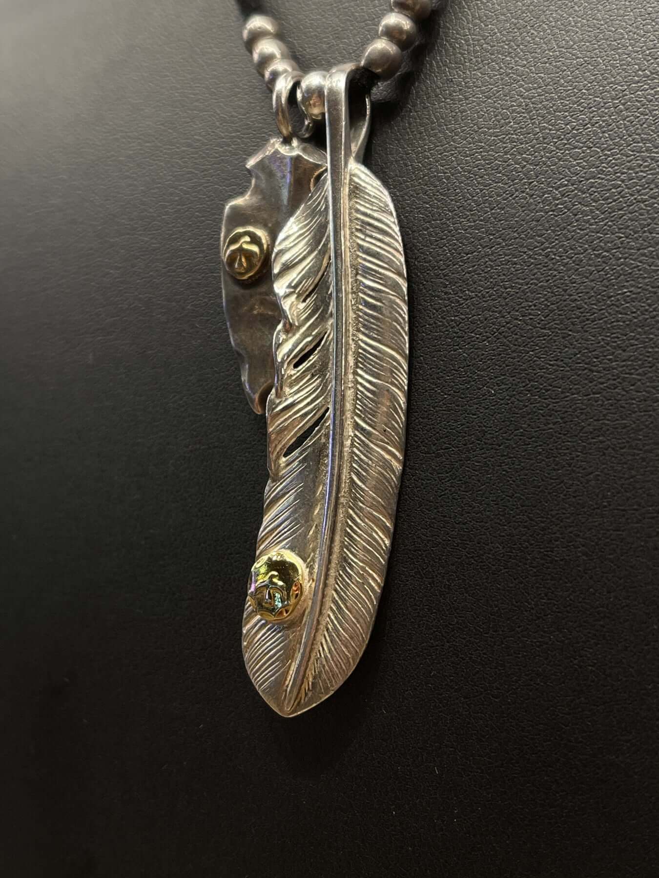Goros Feather With Metal And Arrowhead Setup