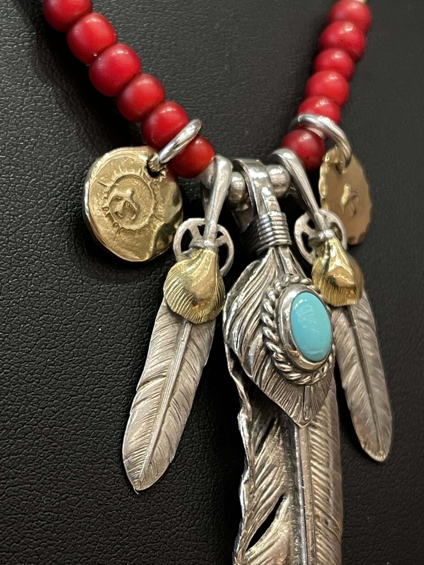 Goros Turquoise Feather With Red Beads Leather Cord Setup