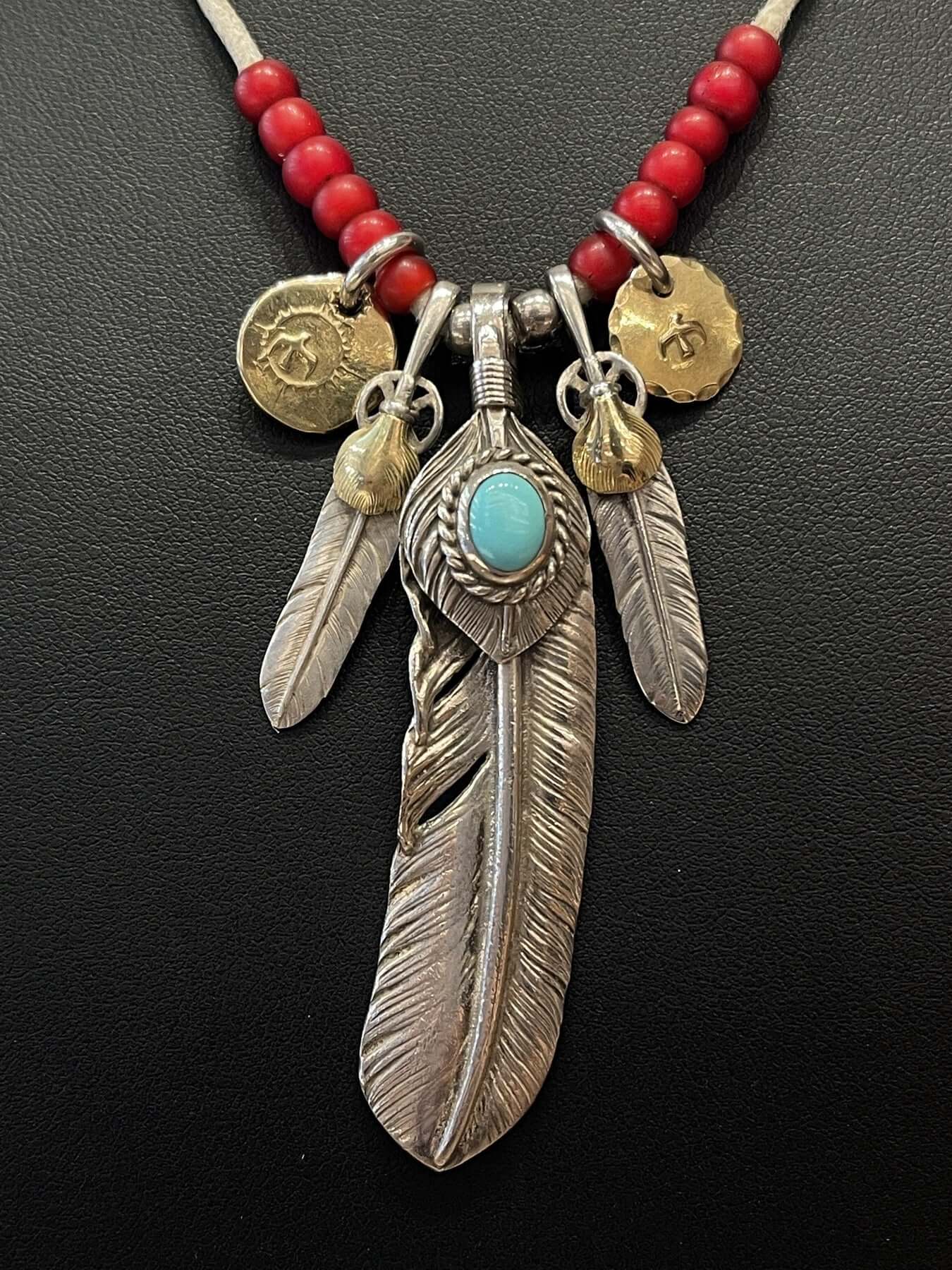 Goros Turquoise Feather With Red Beads Leather Cord Setup