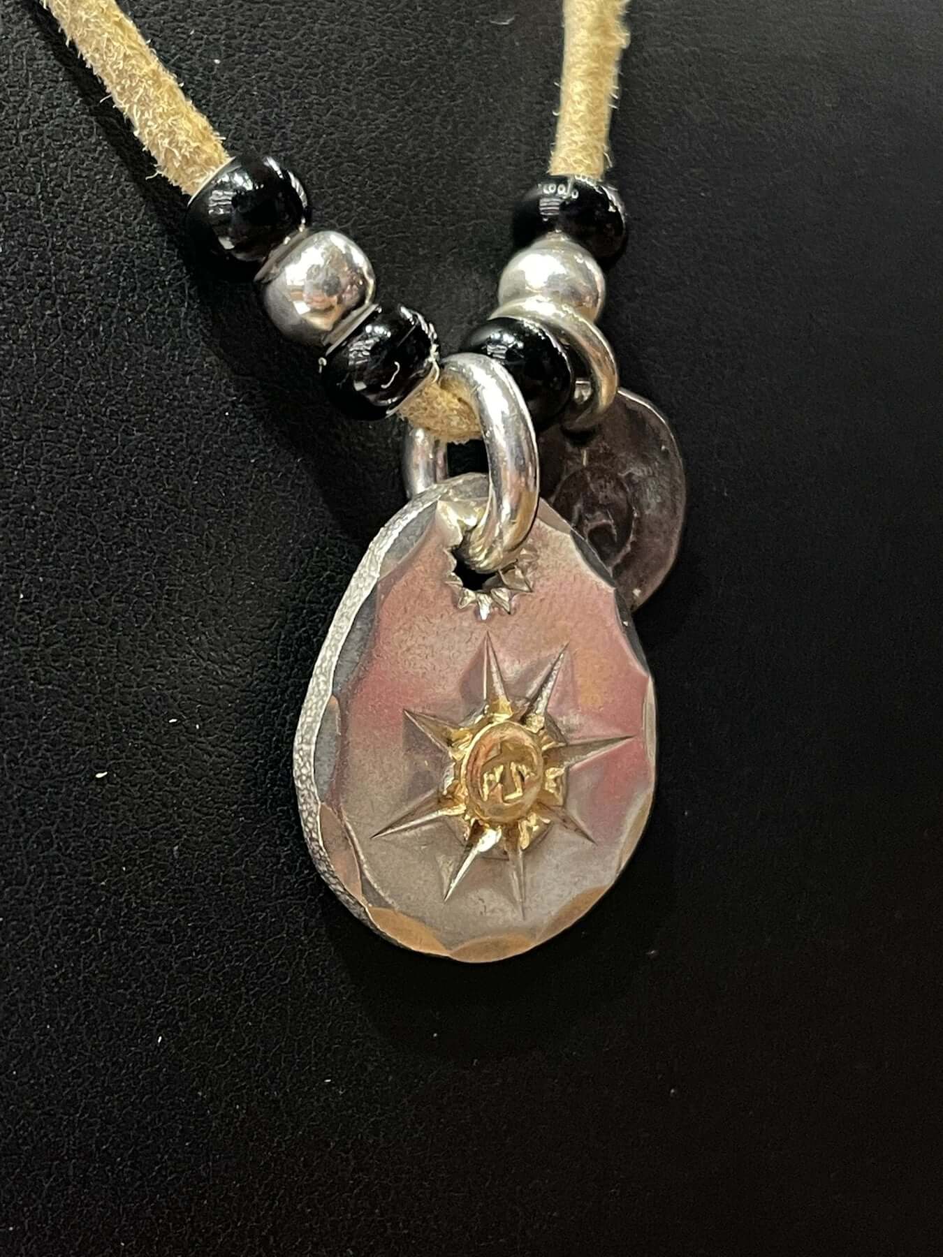 Goros Metal Pendant Setup With Leather Cord