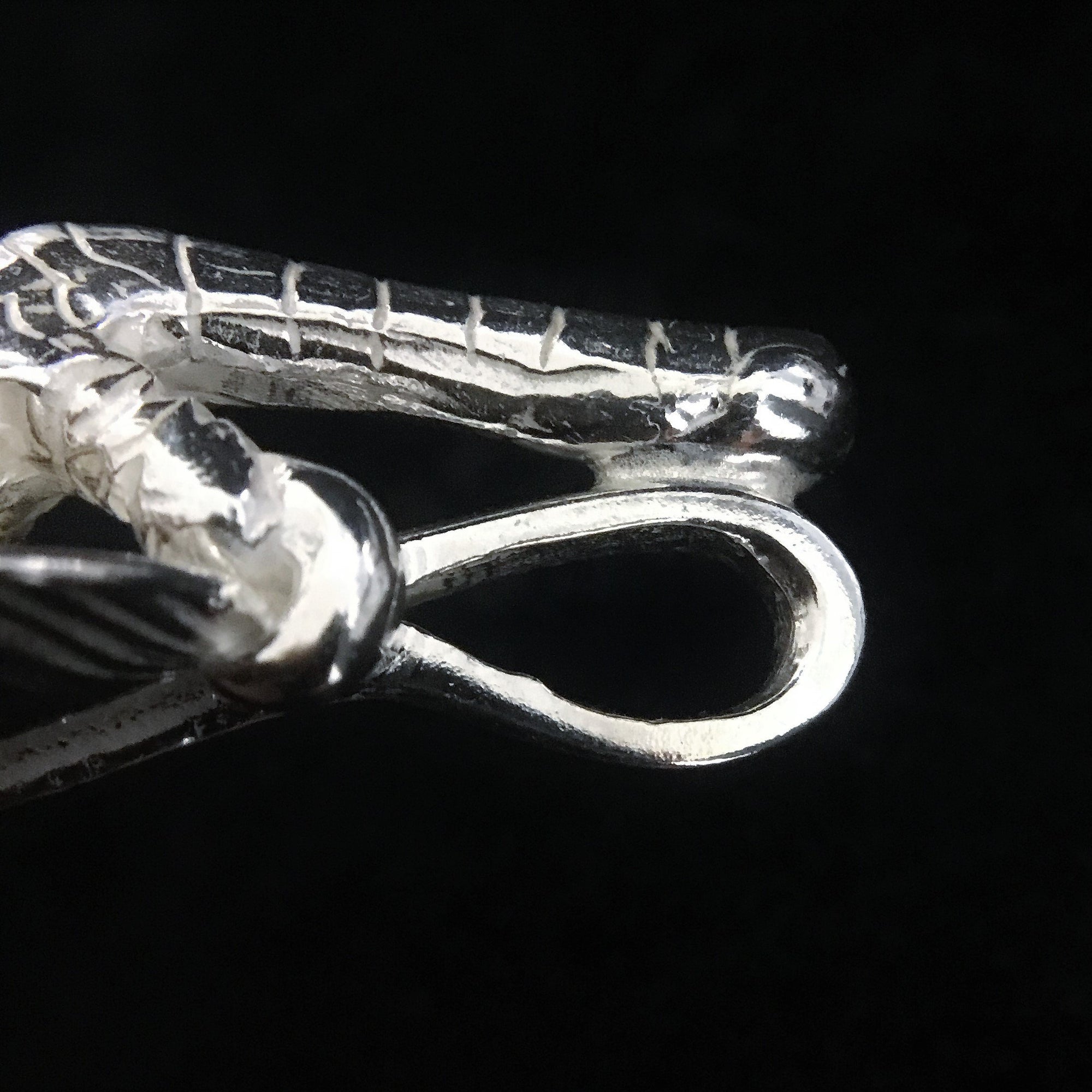 Feather with Silver Claw - Facing Left | Goro&#39;s Authorized Dealer