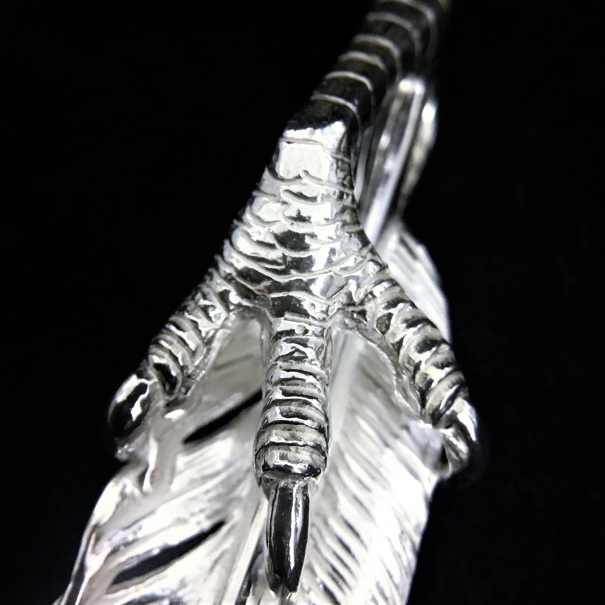 Feather with Silver Claw - Facing Right | Goro&#39;s Authorized Dealer