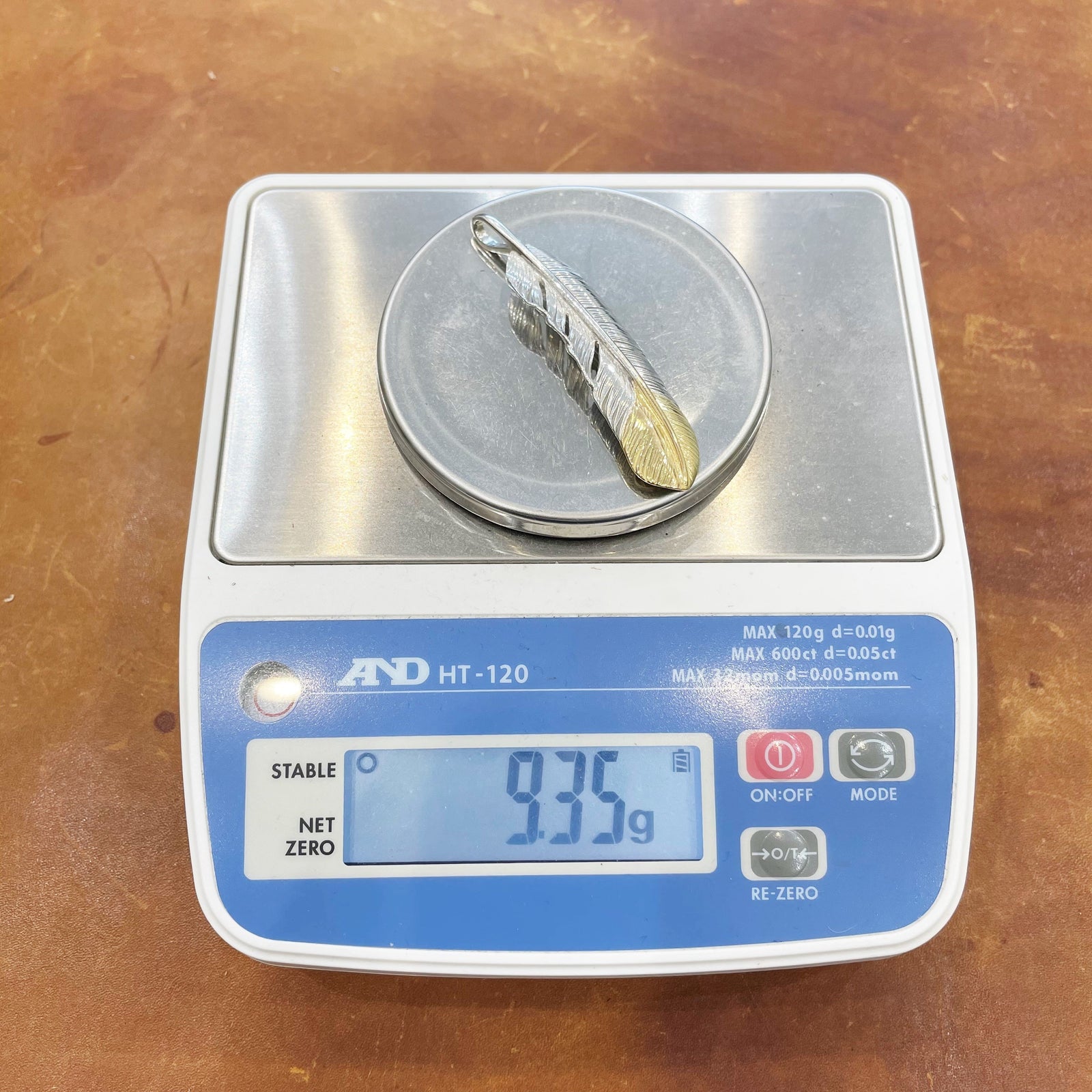 Gold Tip Feather - Facing Right | Goro&#39;s Native Feather Authorized Dealer