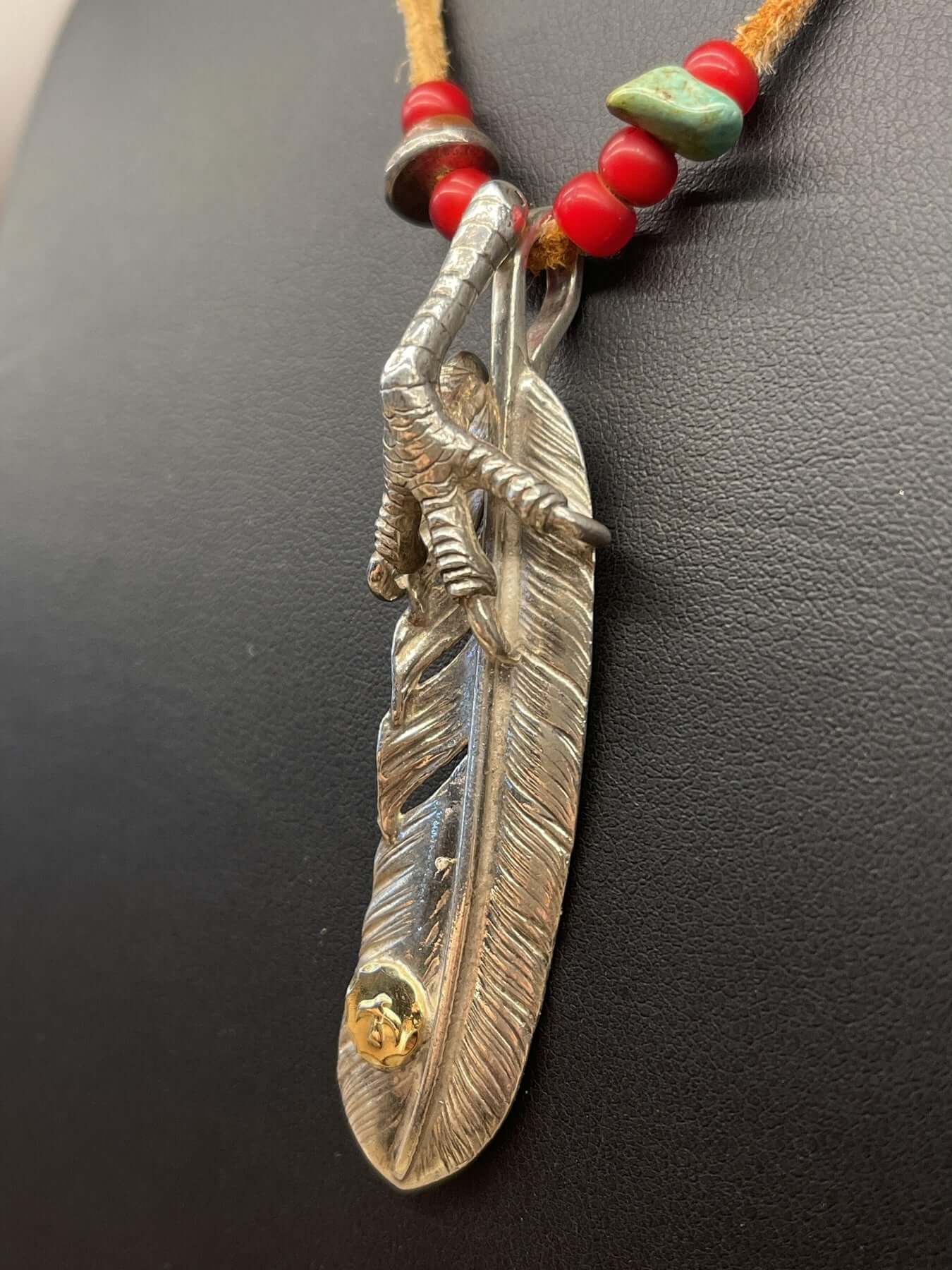 Goros Feather With Silver Claw and Leather Cord Setup