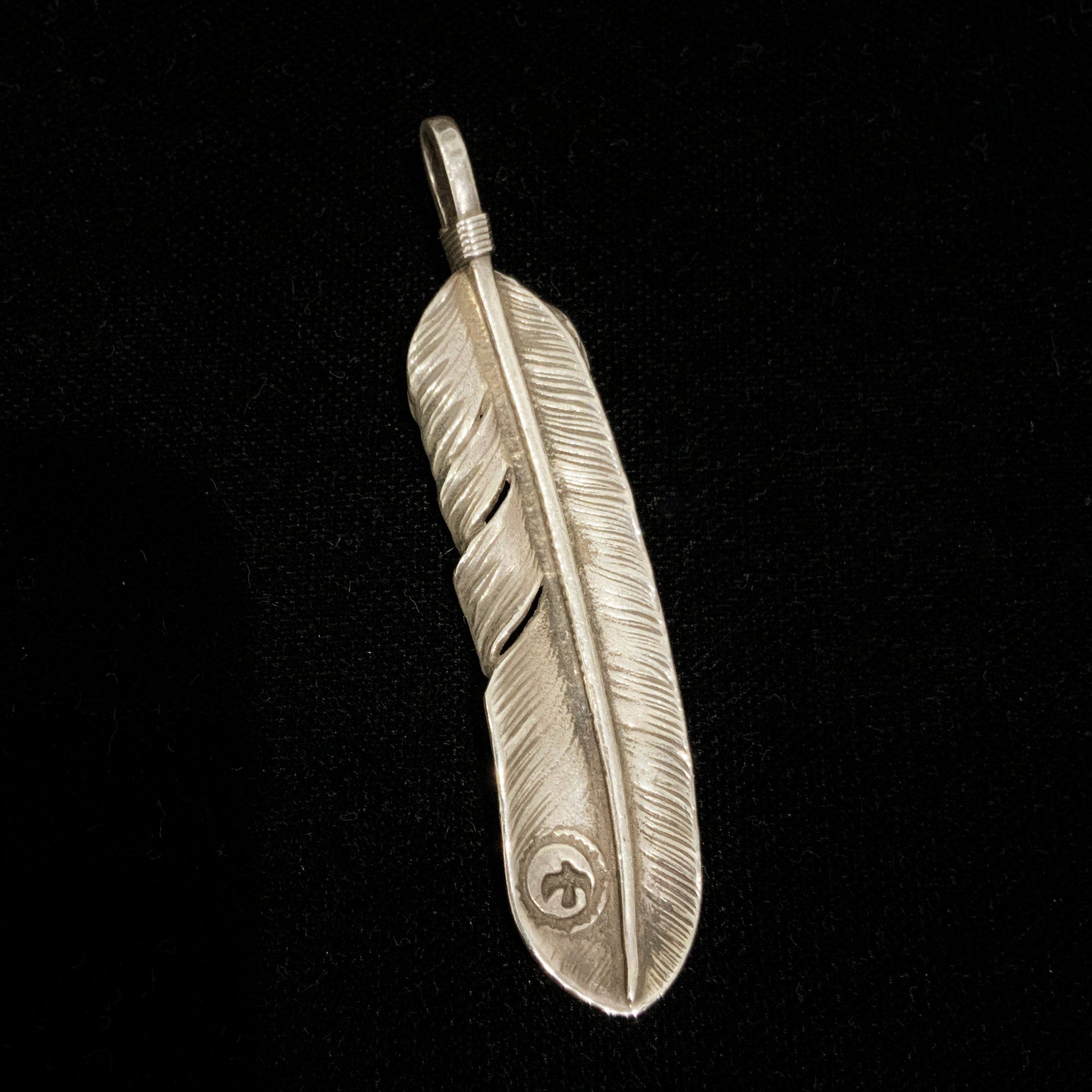 Silver Feather - Facing Left  | Goro&#39;s Feather Authorized Dealer