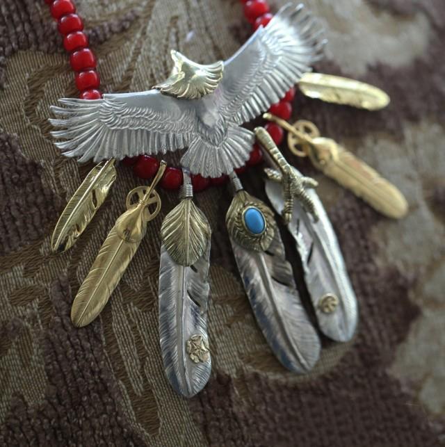 Eagle with Gold, Turquoise, and Silver Feather Setup | Goros Feather Authorized Dealer