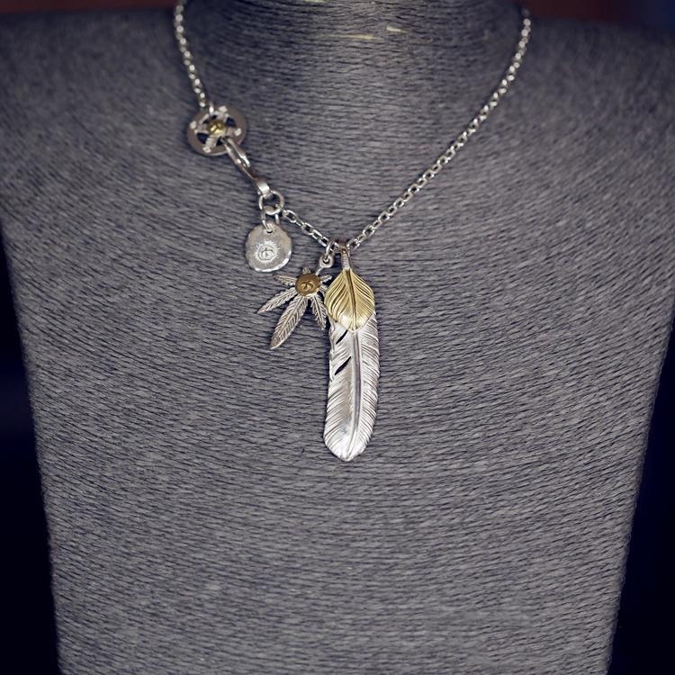 Gold Top Feather, Grass with 18K Gold, and Silver in Sun Metal Setup | Goros Feather Authorized Dealer