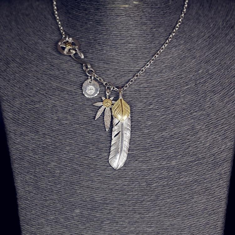 Gold Top Feather, Grass with 18K Gold, and Silver in Sun Metal Setup | Goro&#39;s Feather Authorized Dealer