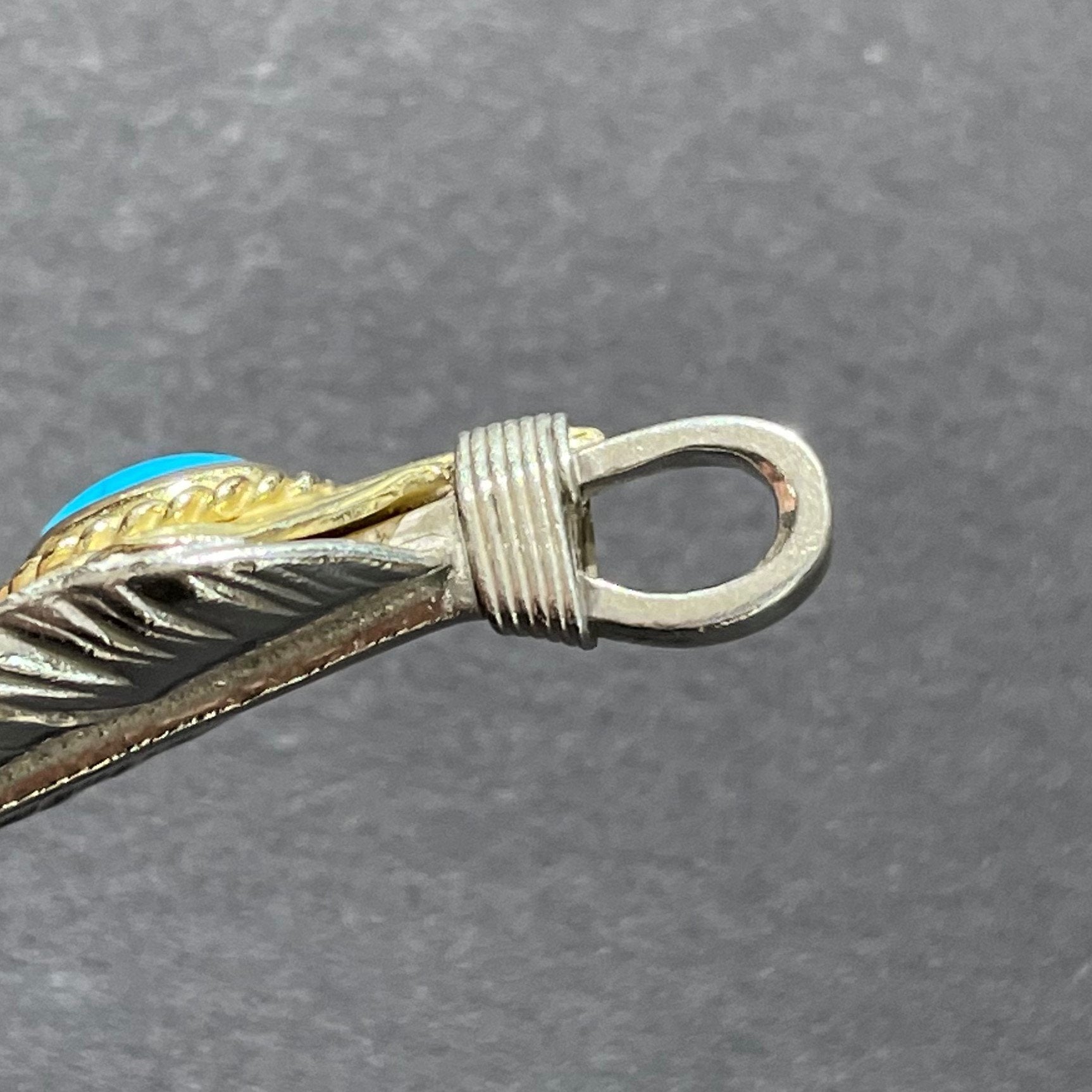 Goro&#39;s Turquoise Feather Gold Rope - Facing Left | Goro&#39;s Native Feather Authorized Dealer