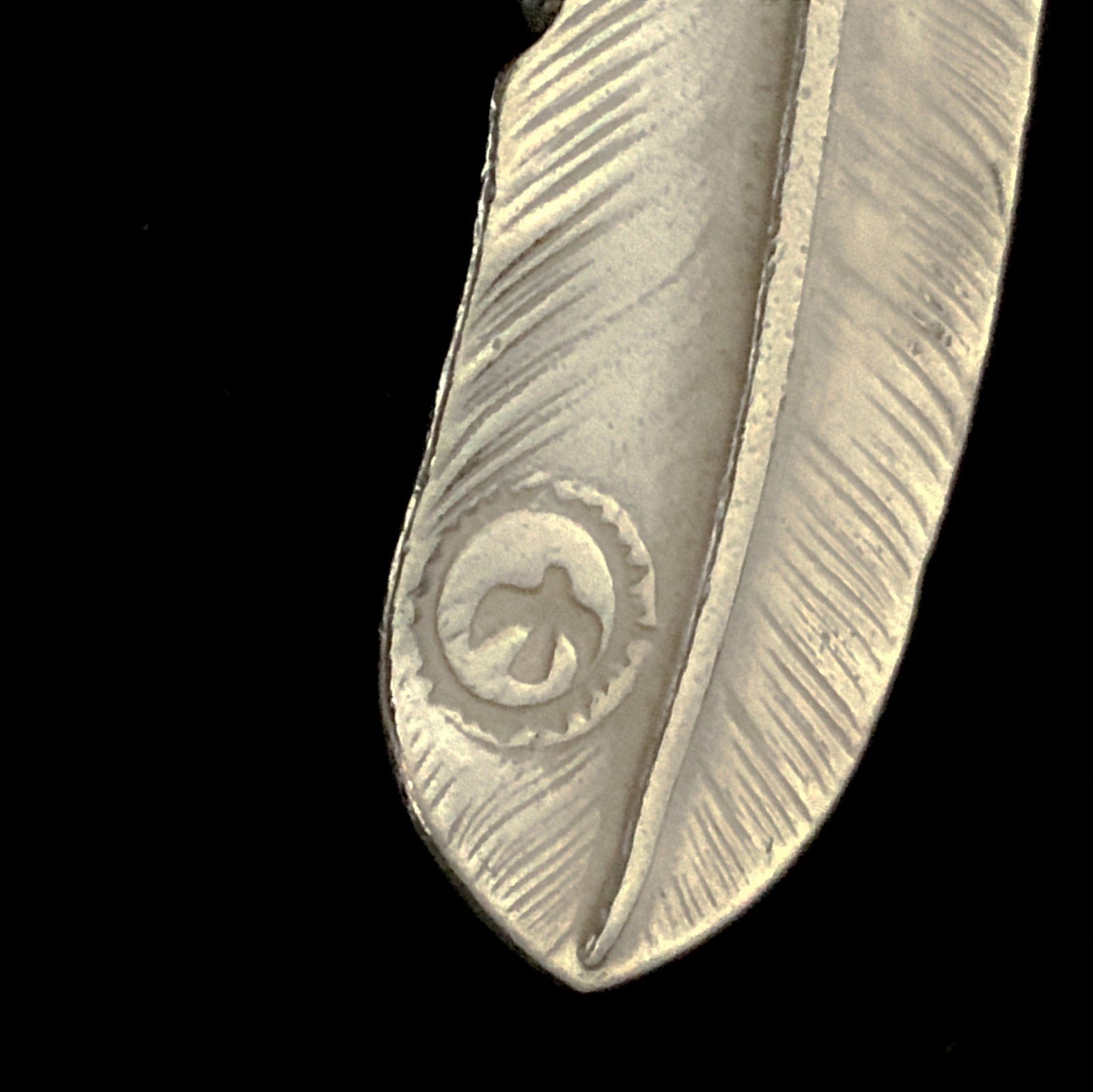 Turquoise Feather Silver Gold Rope - Facing Left | Goro&#39;s Native Feather Authorized Dealer