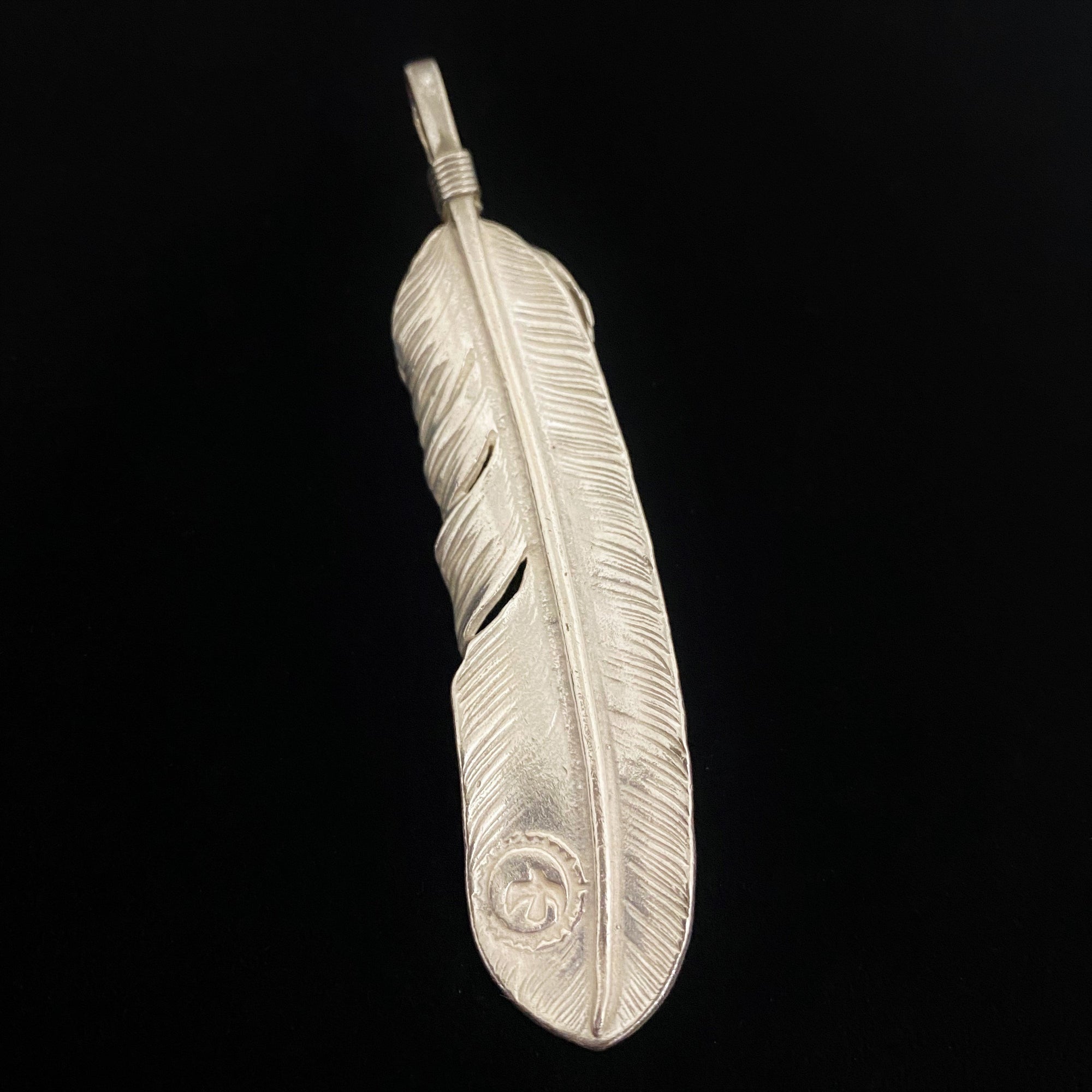 Turquoise Feather Silver Rope - Facing Left | Goro&#39;s Native Feather Authorized Dealer
