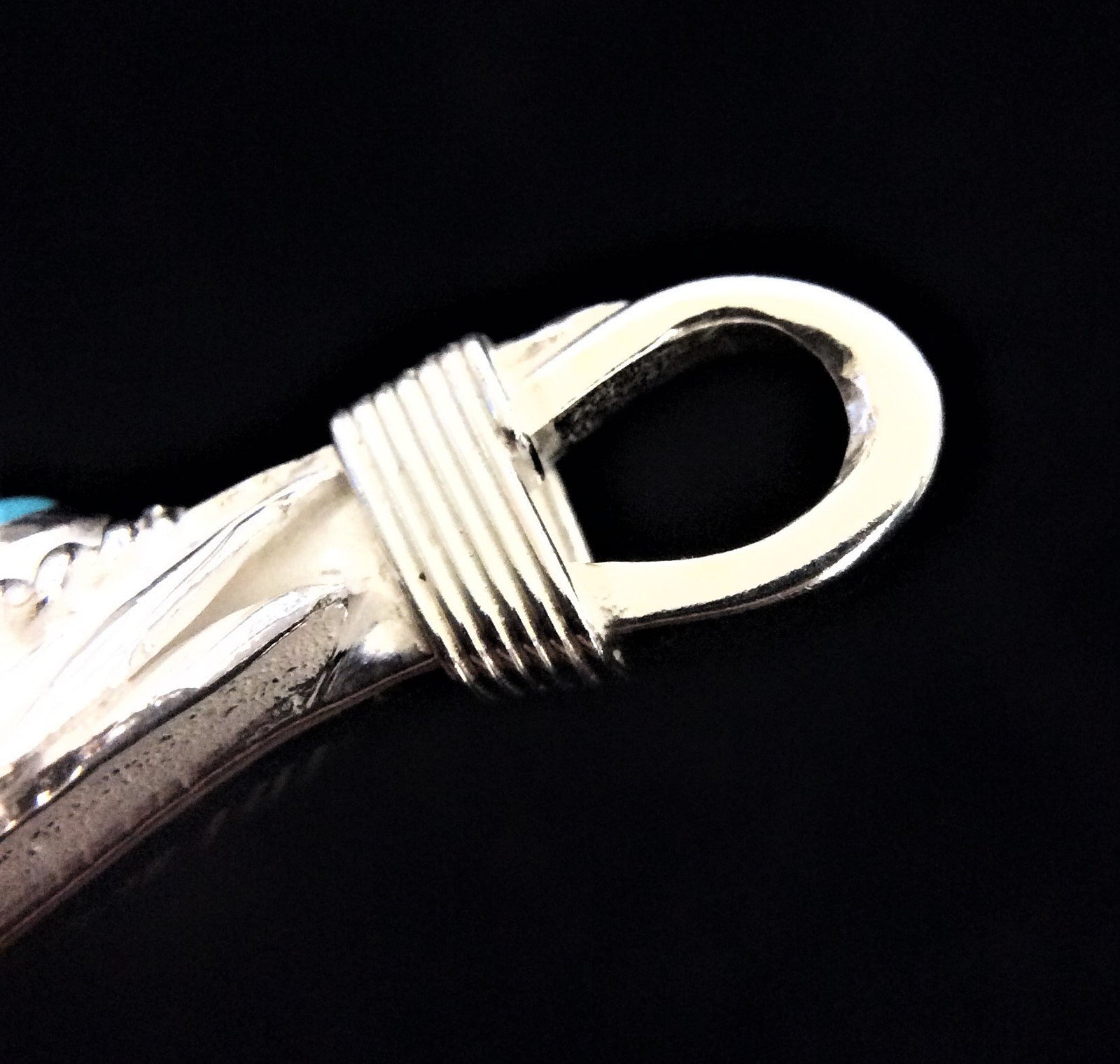 Turquoise Feather Silver Rope - Facing Right | Goro&#39;s Native Feather Authorized Dealer