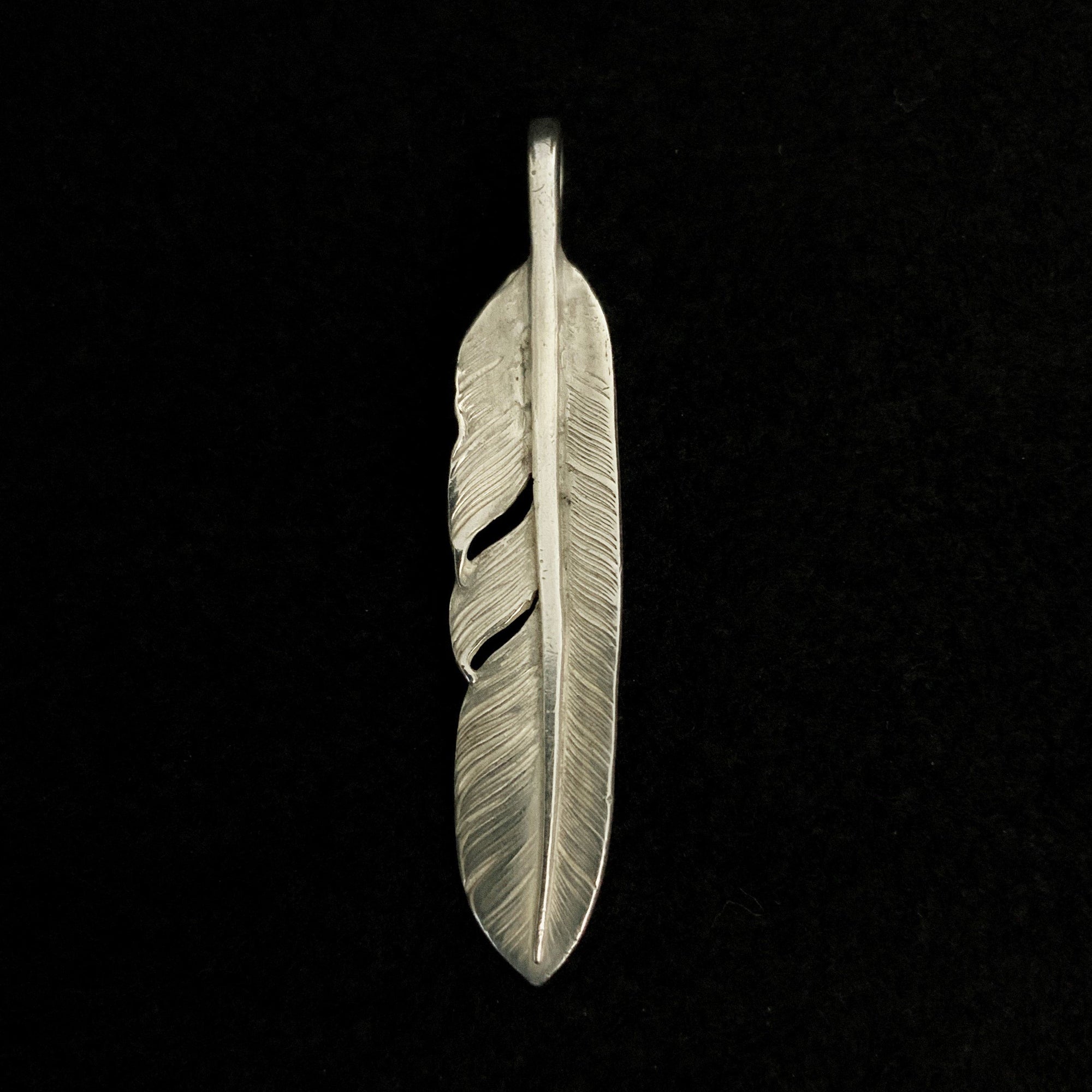 Silver Feather-Facing Right  | Goro&#39;s Native Feather Authorized Dealer